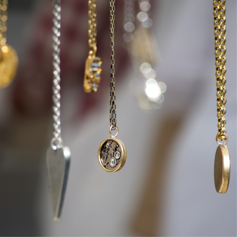 Closeup of necklace pendants